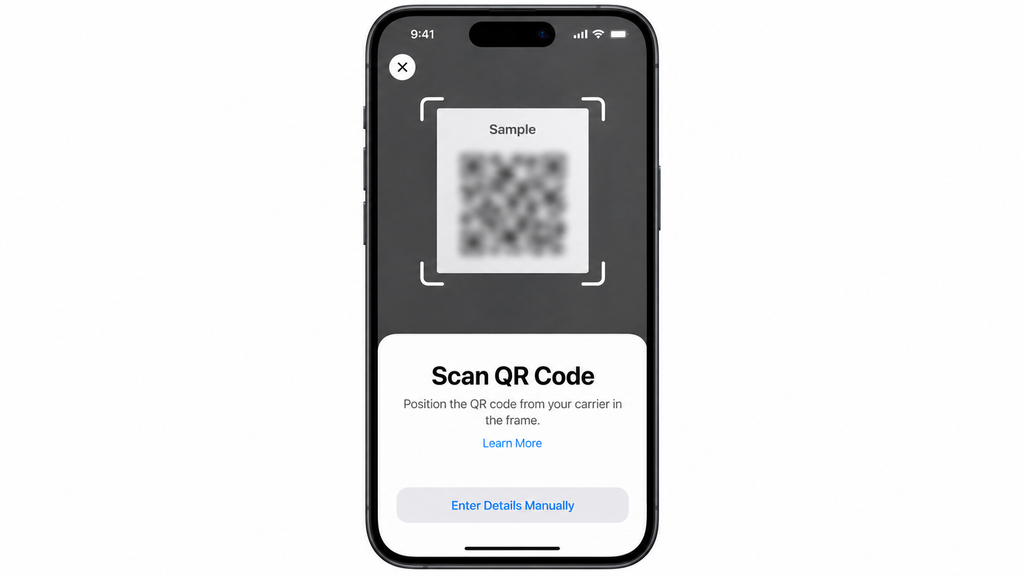Scanning a carrier-issued QR code to install an iPhone eSIM.